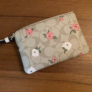 Coach wristlet floral pattern